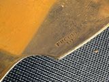 a close up of a piece of metal on a table