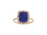une bague en or sertie d'une pierre bleue entourée de diamants bleus et blancs