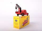 a red toy truck with a crane on top of it