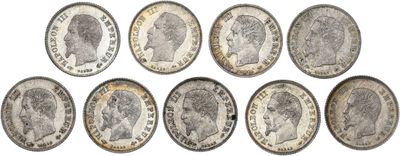 a group of six different british coins on a white background