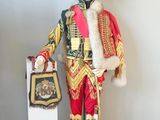 a statue of a man dressed as a soldier