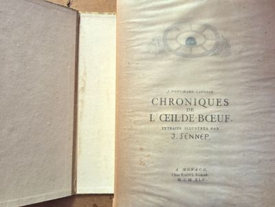 un livre sur lequel figure l'image d'une horloge