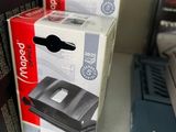 three boxes on a table with a laptop on top of it