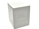 an image of a white box with the word omega on it