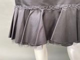 grey skirt with ruffles on a mannequin mannequin mannequin mannequin mannequin mannequin mannequin mannequin