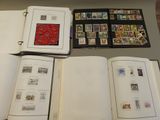 a lot of different stamps on the pages of a book