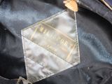 a close up of a bag with a label on it
