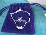 a small blue bag with a white logo on it