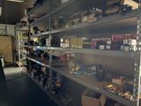 many shelves with boxes and boxes on them in a warehouse