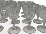a lot of empty wine glasses on the table