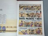 an open book with a comic strip in the middle of it