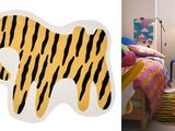 two pictures of a bedroom with a tiger rug on the floor