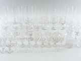 a lot of empty wine glasses sitting on a table