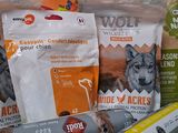 many different types of dog food on the table