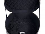 the inside of a black and white suitcase with a handle