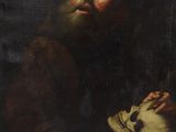 un tableau représentant un homme tenant un crâne dans la main