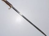 an image of a knife on a white surface