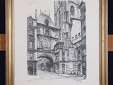 framed drawing of a building with a clock on the front of it