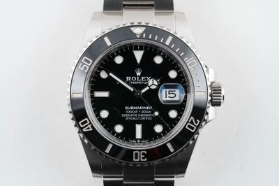 rolex submarine watch with black dial and stainless steel bracelet