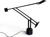 a black table lamp with a black base and a white background
