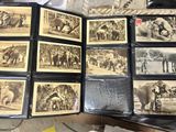 a lot of old photos of elephants in a book