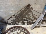 a chair that is sitting on the ground next to a ladder