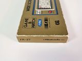 a box with a clock on it sitting on a table
