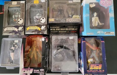 a lot of action figures that are on the table