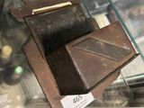 a chocolate box that is on display in a glass case