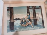une photo d'un homme sur un bateau dans l'eau