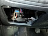 the inside of a car showing the inside of the engine compartment and the inside of the engine compartment