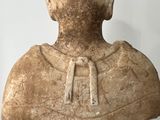 an image of a statue of a man with a hat on