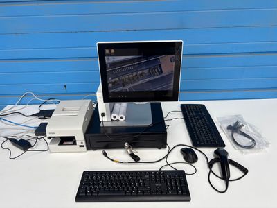 a desktop computer sitting on top of a desk with a keyboard and mouse