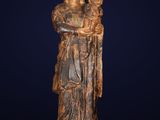 a statue of a woman holding a child in her arms