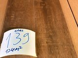a piece of wood that has a price tag on it