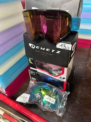a box with a pair of goggles sitting on top of it