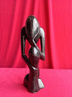 an image of a statue of a man holding a woman ' s hand