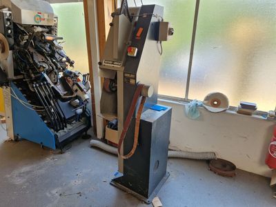 a machine that is sitting in the corner of a room
