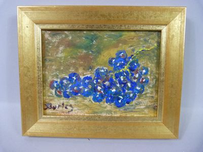 tableau représentant des fleurs bleues dans un cadre doré sur fond blanc