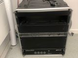 a stack of three black and silver speakers on top of each other