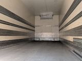 a empty room with a lot of lines on the walls