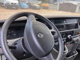 dashboard of a car with a steering wheel and dashboard controls