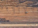 a picture of a piece of wood that is on a table