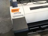a machine that is sitting on the floor in the room
