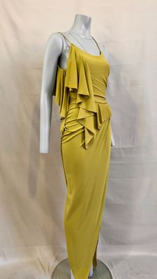 a woman ' s yellow dress on a mannequin mannequin mannequin mannequin mannequin mannequin mannequin mannequin
