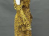 a yellow and black leopard print dress on a mannequin mannequin mannequin mannequin mannequin mannequin mannequin manne