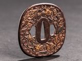a close up of a small metal object on a table