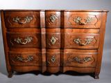 an image of a wooden chest of drawers with brass handles