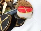 many hats that are sitting in a box together