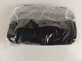 a bag of chocolate sitting on top of a white table